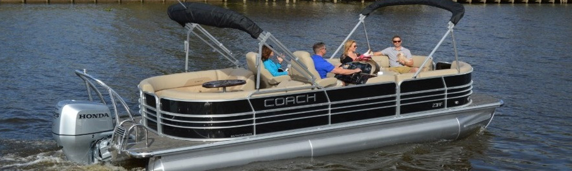 A group of individuals cruising on a Party Cat Pontoon.